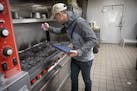 Minnesota Health Department inspector Kevin Keopraseuth inspected a catering establishment in January 2019 in Minneapolis.