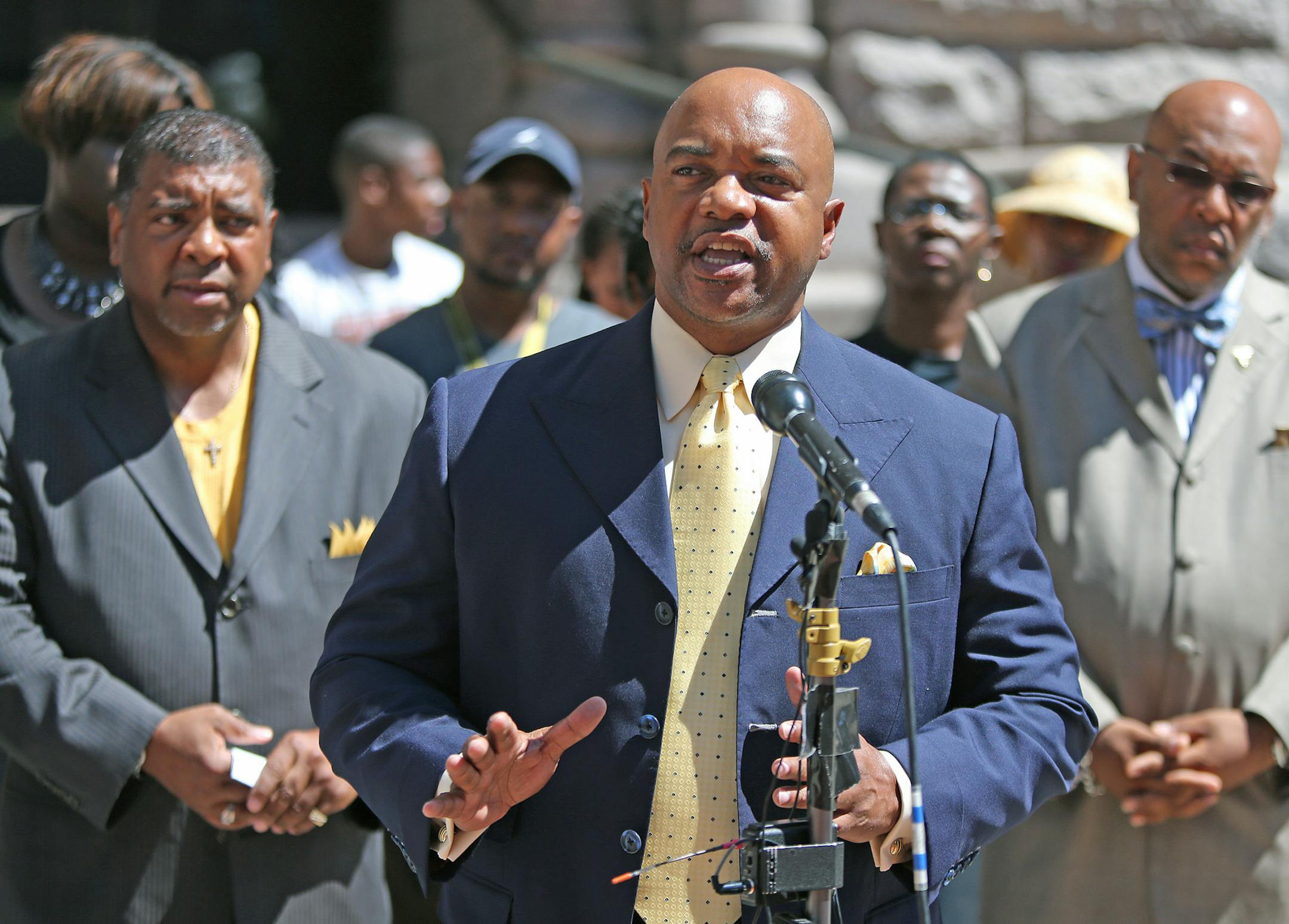 Pastor Jerry McAfee, center, was among those who met Wednesday to discuss racial issues confronting Minneapolis police. , and Nakima Levy Pounds, Anthony Newby, Mel Reeves, Justice 4 Terrance Franklin Committee, Communities United Against Police Brutality gathered to demand police accountability in front of City Hall, Wednesday, August 7, 2013 in downtown Minneapolis, MN. (ELIZABETH FLORES/STAR TRIBUNE) ELIZABETH FLORES • eflores@startribune.com