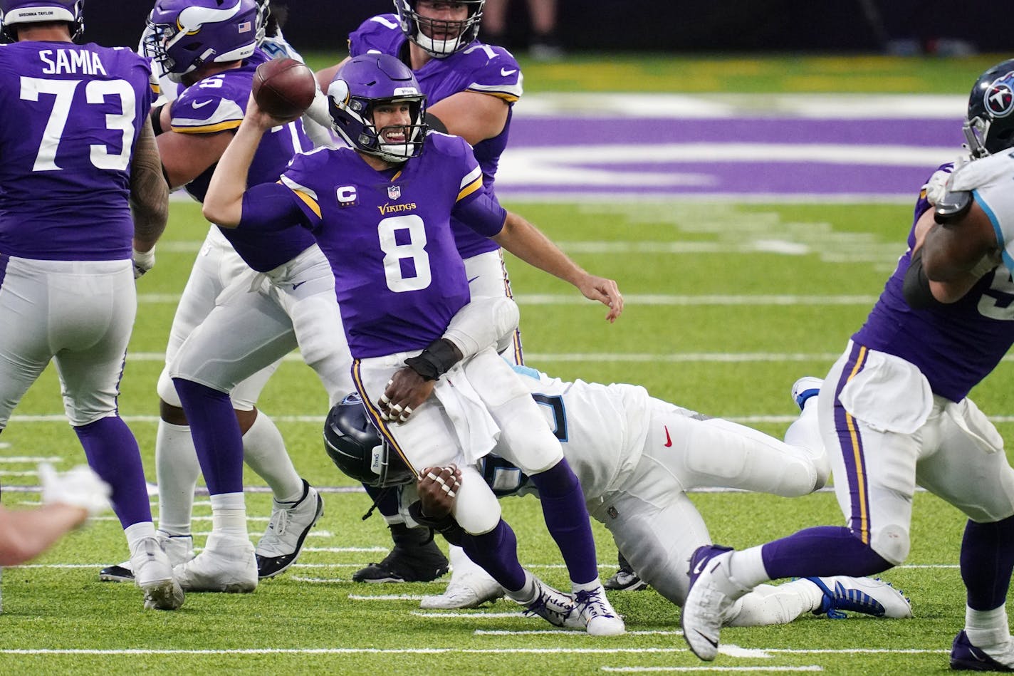 Minnesota Vikings quarterback Kirk Cousins (8) was sacked as he made a pass in the fourth quarter. ] ANTHONY SOUFFLE • anthony.souffle@startribune.com The Minnesota Vikings played the Tennessee Titans in an NFL game, sans fans to comply with legislation meant to slow the spread of COVID-19, Sunday, Sept. 27, 2020 at U.S. Bank Stadium in Minneapolis.