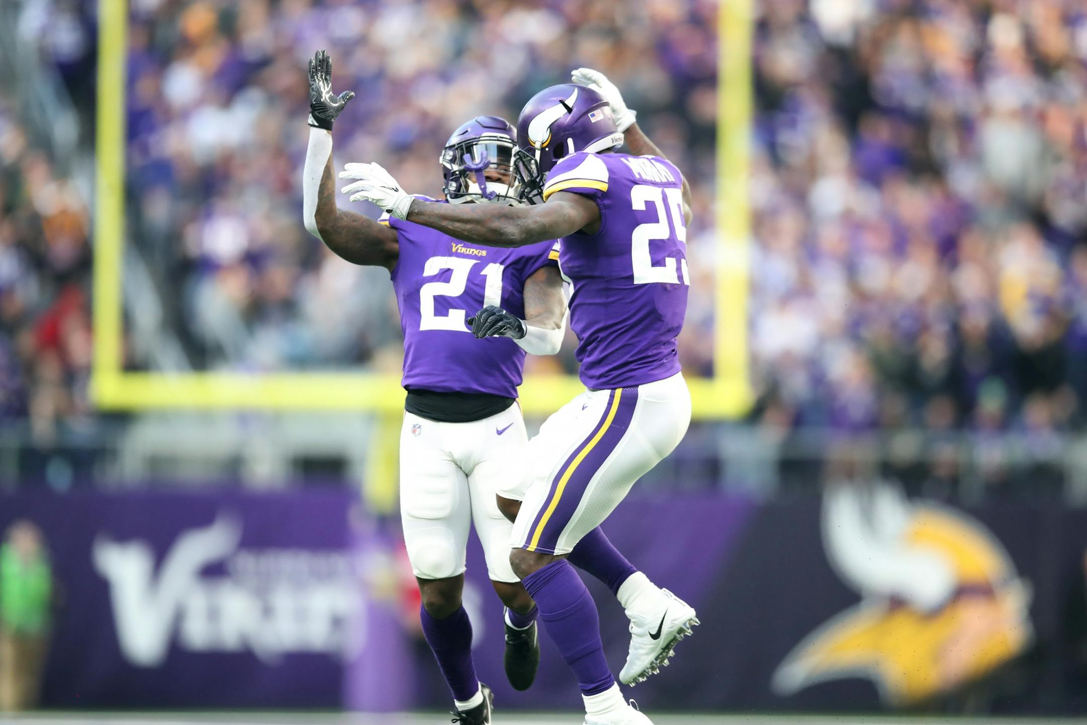 Minnesota Vikings running back Latavius Murray (25) celebrated his one yard touchdown run with Jerick McKinnon (21) in the first quarter at U.S. Bank Stadium Sunday December 31, 2017 in Minneapolis, MN.
