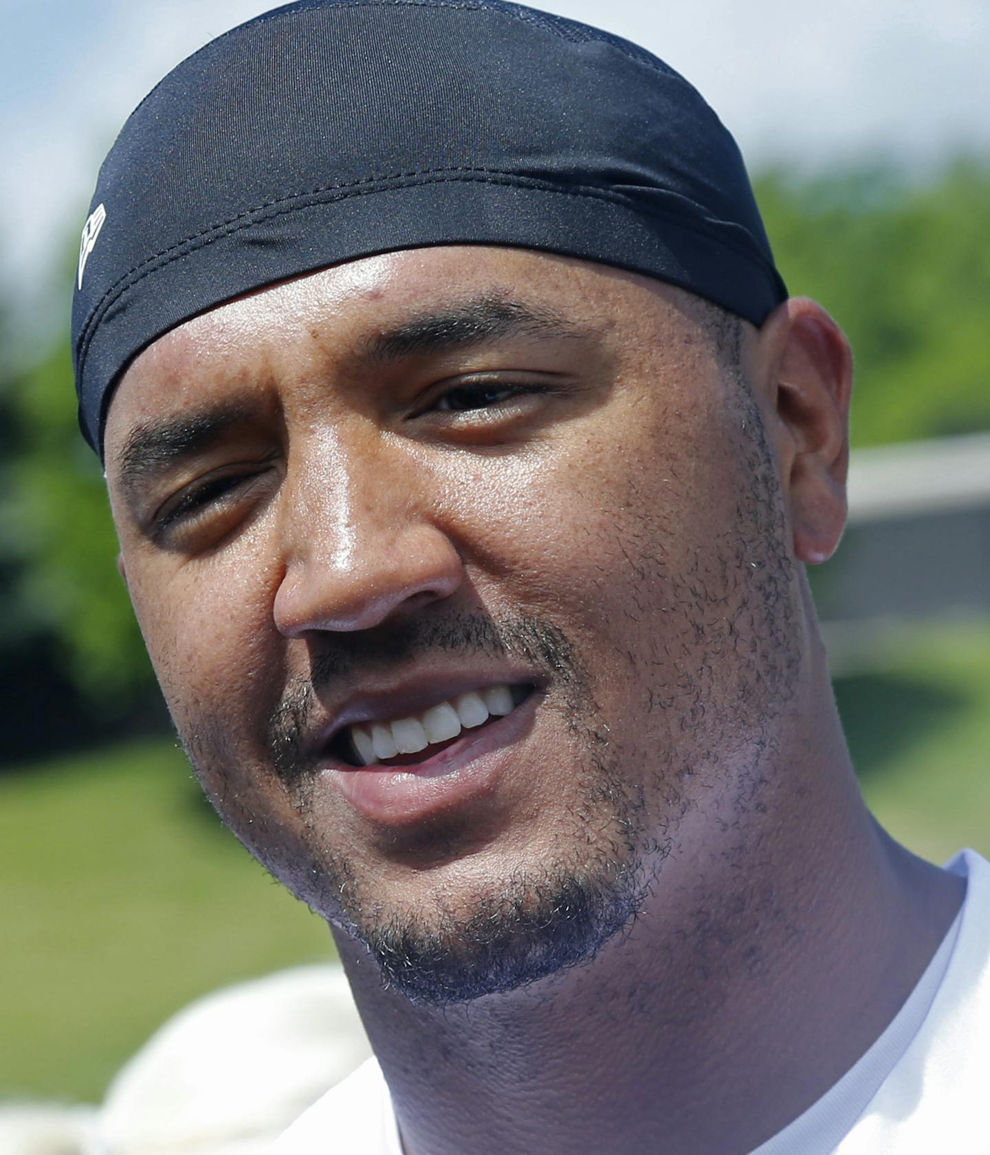 Minnesota Vikings wide receiver Michael Floyd talks with the media after NFL football practice Wednesday, May 24, 2017, in Eden Prairie, Minn. Back in his native state, with family, friends and former Notre Dame teammates now around him, Floyd is in position to get his career and life back on track following a drunken driving sentence. (AP Photo/Jim Mone)