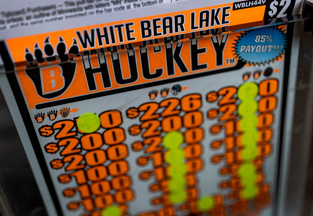 Custom pull-tabs sold at Jimmy’s feature the logo for White Bear Lake Hockey.