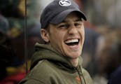 Zach Parise, laughed while watching the Defending the Blue Line NHL Players Charity Game from the bench at Ridder Arena in Minneapolis on Wednesday.