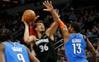 Wolves forward Dario Saric (shown in a recent game against the Thunder) had 13 points and six rebounds Saturday night in a 135-130 overtime victory ov