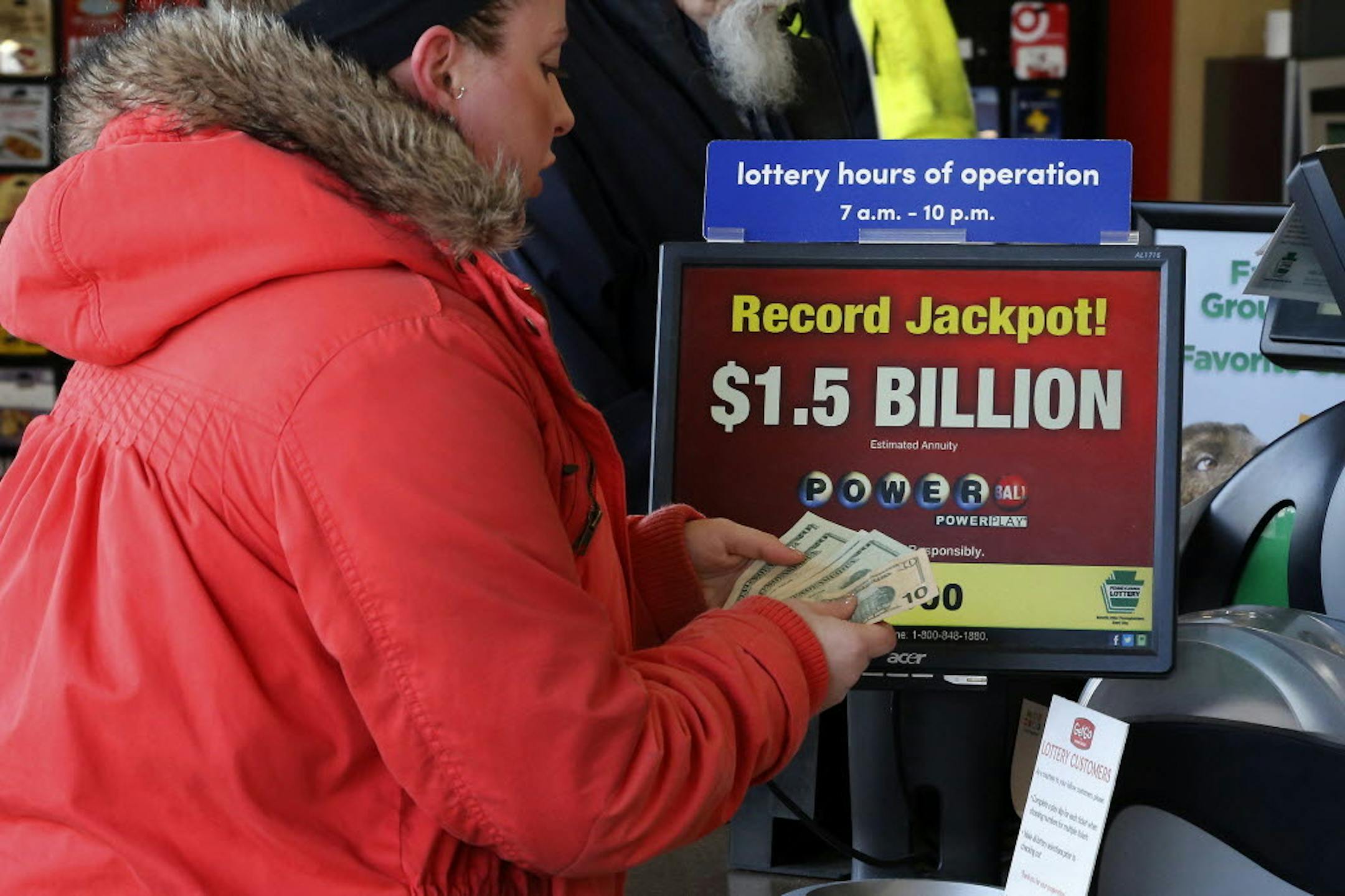 A woman handed over the money for her Powerball tickets at a minimart in Pittsburgh.