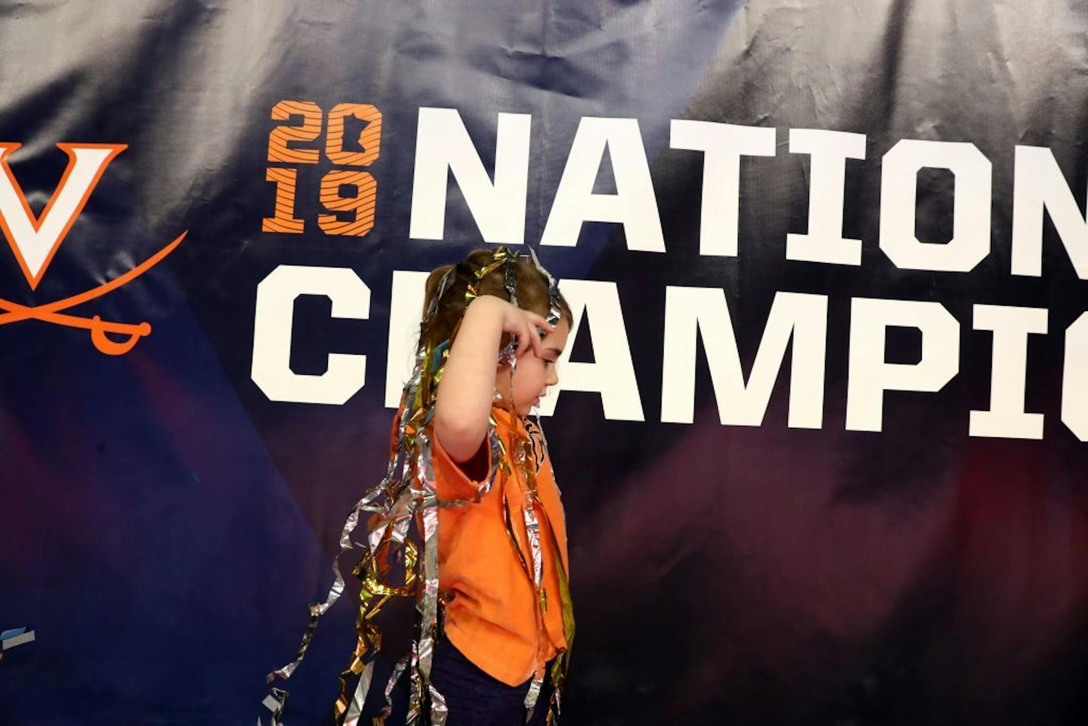 A Virginia fan celebrated after her team won the NCAA championship.