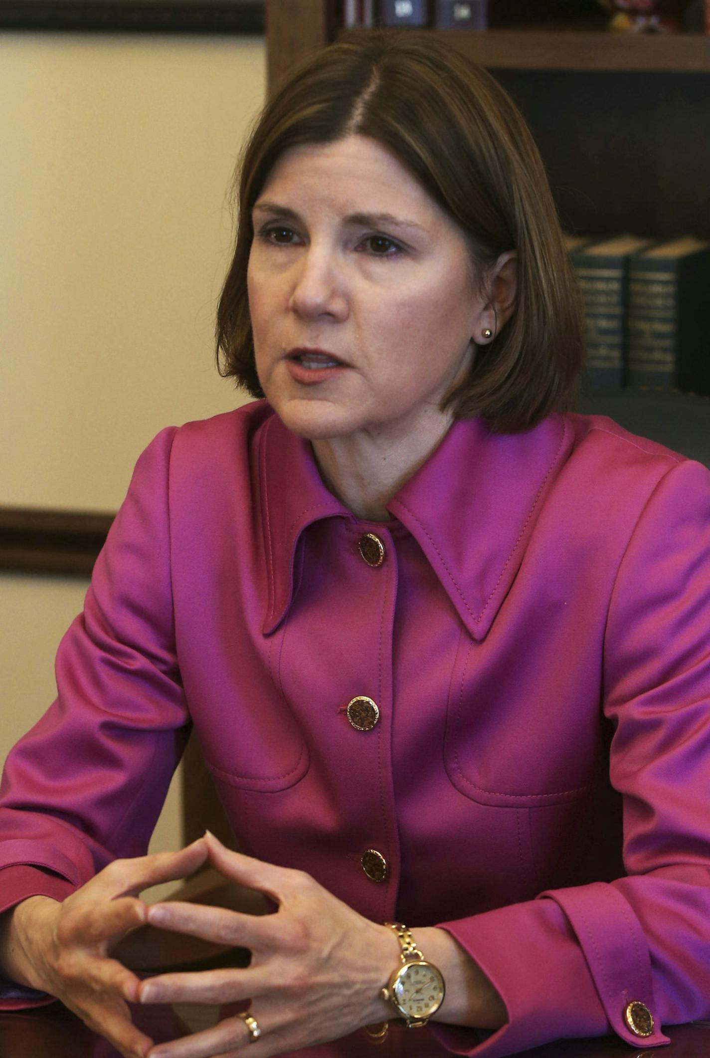 In this March 12, 2018 photo, Minnesota Attorney General Lori Swanson speaks during an interview at the State Capitol in St. Paul, Minn. Swanson said she's particularly proud of the $850 million settlement she reached with 3M last month in a lawsuit alleging the manufacturer's chemicals contaminated groundwater in the eastern Twin Cities metro area. It's the largest environmental settlement in Minnesota history, and the third-largest natural resource damage settlement in U.S. history. (AP Photo/