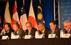 Trade ministers of the United States and 11 other Pacific Rim countries attend a press conference after negotiating the Trans-Pacific Partnership (TPP
