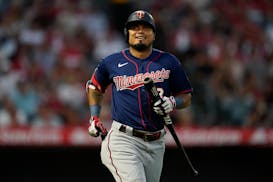 Minnesota Twins' Luis Arraez (2) reacts after lining out to right field during the fourth inning of a baseball game against the Los Angeles Angels in 