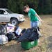 Dakota County&#xed;s Master Recycler/Composter program. Melinda Kawalek weighs materials after an event.