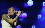 Chester Bennington lead vocals for the band Linkin Park performed for the audience at the State Fair Tuesday night August 26 , 2014 in Falcon Heights 