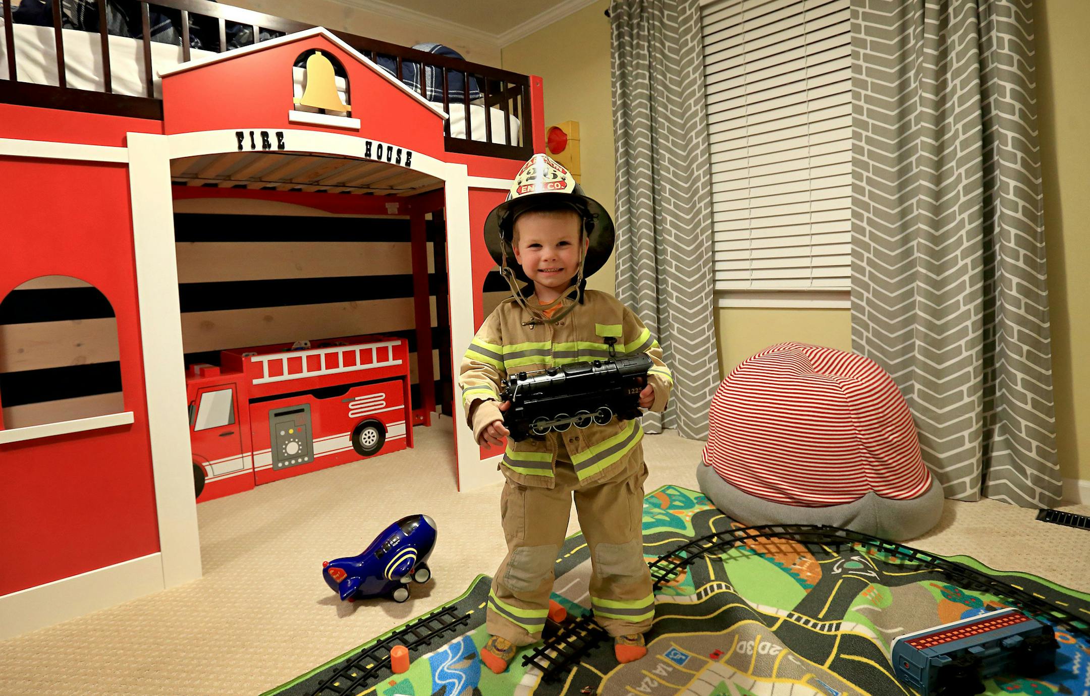 Ague Powers, 4, stands in his bedroom, which was remodeled in October by the non-profit Special Spaces, on Tuesday Nov. 28, 2017 at his home in Des Peres, Mo.