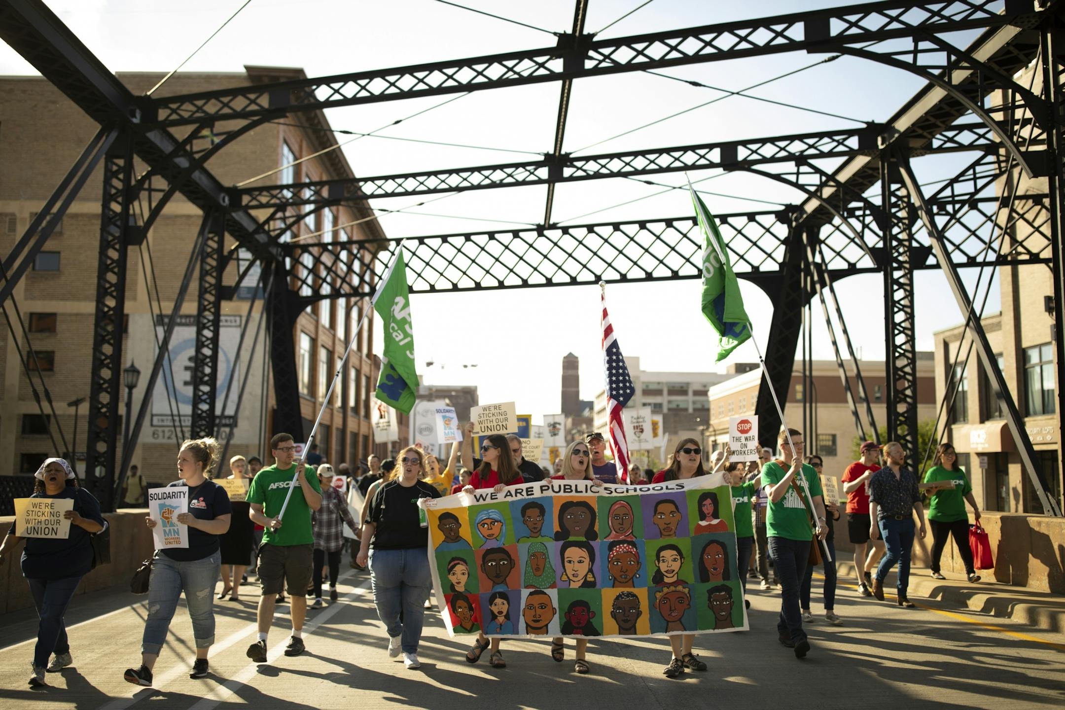 The demonstrators marched on Washington Ave. to the U.S. Federal Courthouse.