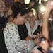 Movie star Sandra Bullock signs autographs for fans during the premiere of her new film "Heat" in Sydney, Australia, Tuesday, July 2, 2013. (AP Photo/