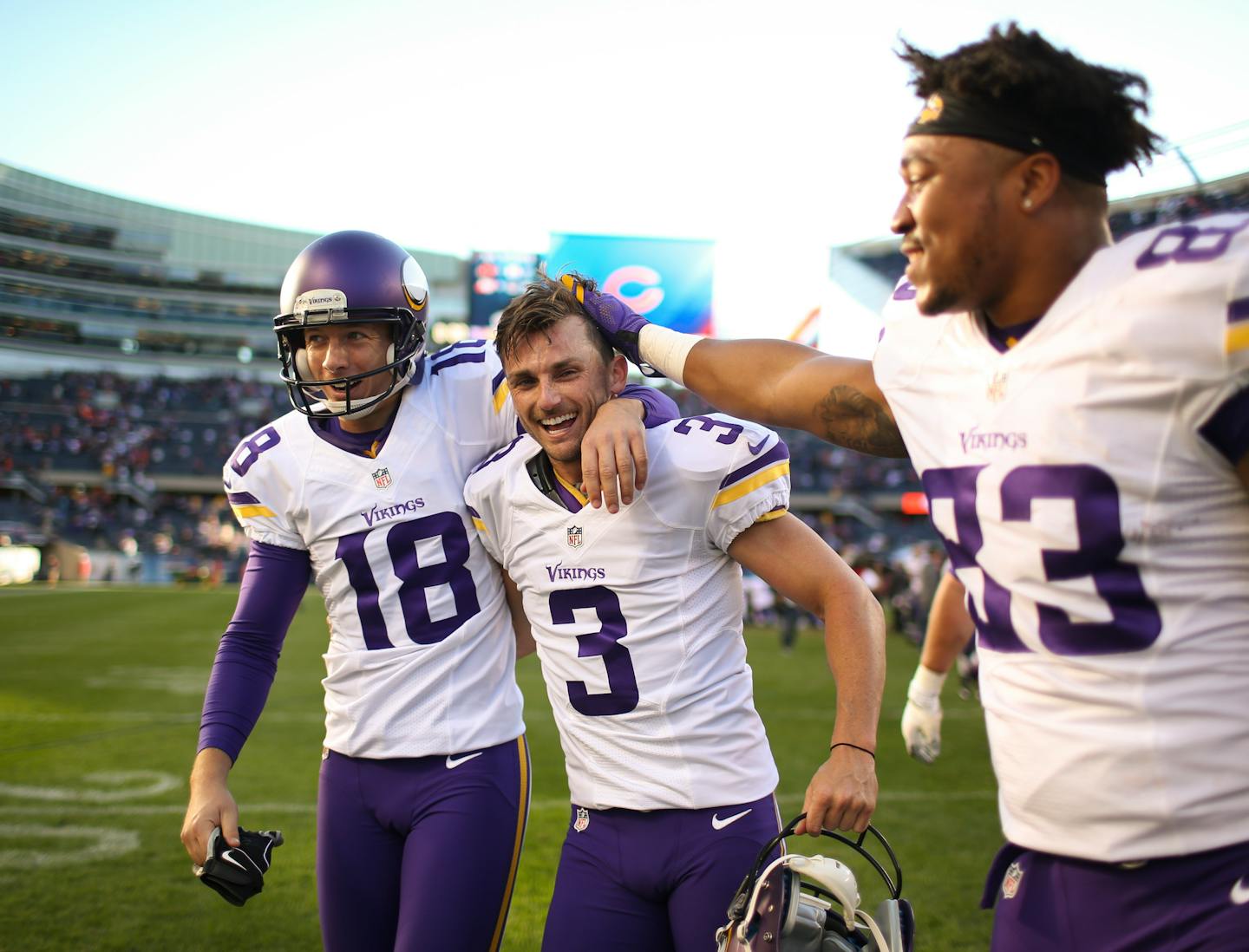 Vikings kicker Blair Walsh (3) was congratulated by punter Jeff Locke (18) and tight end MyCole Pruitt (83) on his way off the field after hitting the game winner in Chicago on Sunday afternoon.