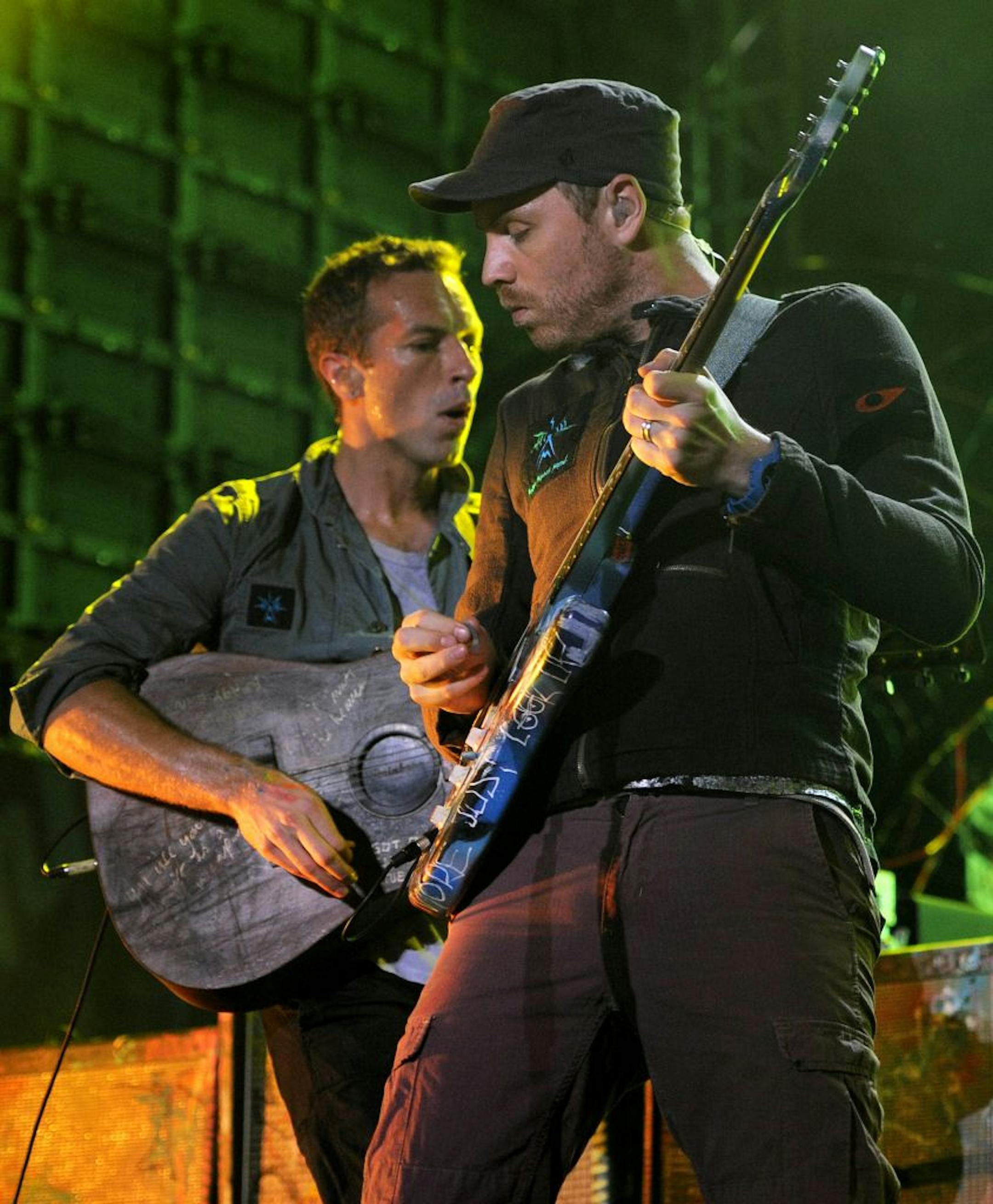 Johnny Buckland, right, and Chris Martin of Coldplay.