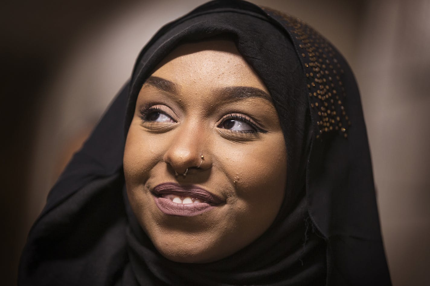 Augsburg student Nahili Abdulahi, 18, gets ready backstage to model during a Hijab Fashion Show at Augsburg College in Minneapolis on Wednesday, February 3, 2016. ] (Leila Navidi/Star Tribune) leila.navidi@startribune.com BACKGROUND INFORMATION: Is the 'hijab solidarity' movement an appropriate way to show support for Muslims at a time when so many feel under siege, or is it cultural appropriation? From the professor at a Christian College who drew praise and ire for her act of wearing the scarf