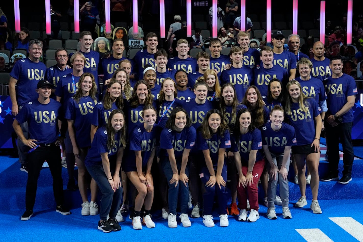 The USA Olympic swim team poses for a picture after the U.S. Olympic Swim Trials on Sunday, June 20, 2021, in Omaha, Neb. (AP Photo/Charlie Neibergall)