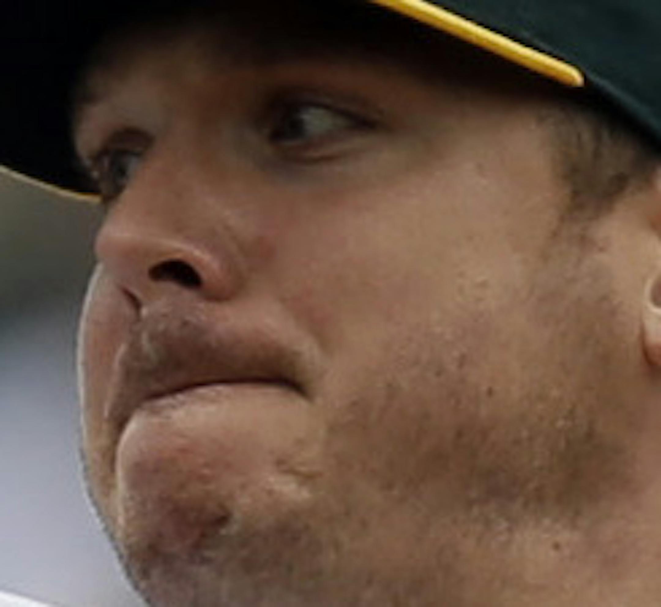 FILE - In this May 17, 2015, file photo, Oakland Athletics pitcher Scott Kazmir works against the Chicago White Sox in the first inning of a baseball game, in Oakland, Calif. The Athletics have begun their expected changes leading up to the trade deadline, sending left-hander Scott Kazmir to his hometown Houston Astros for a pair of minor leaguers. The A's made the announcement ahead of their Thursday afternoon, July 23, 2015, series finale against Toronto, so instead of Kazmir starting against