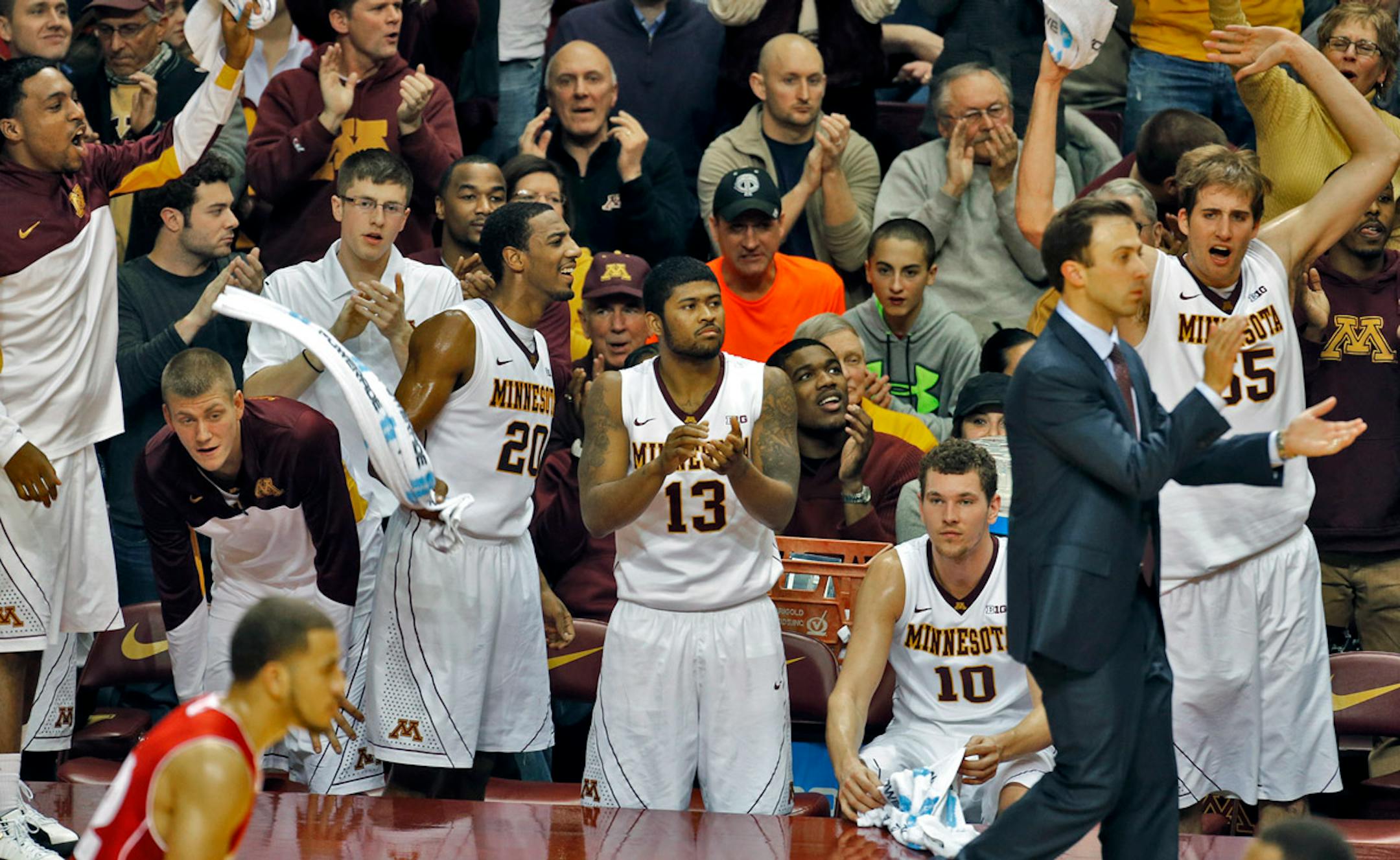 Minnesota Gophers vs. Wisconsin Badgers basketball. Minnesota won 81-68. Minnesota players and fans celebrated their victory at the final horn. (MARLIN LEVISON/STARTRIBUNE(mlevison@startribune.com)