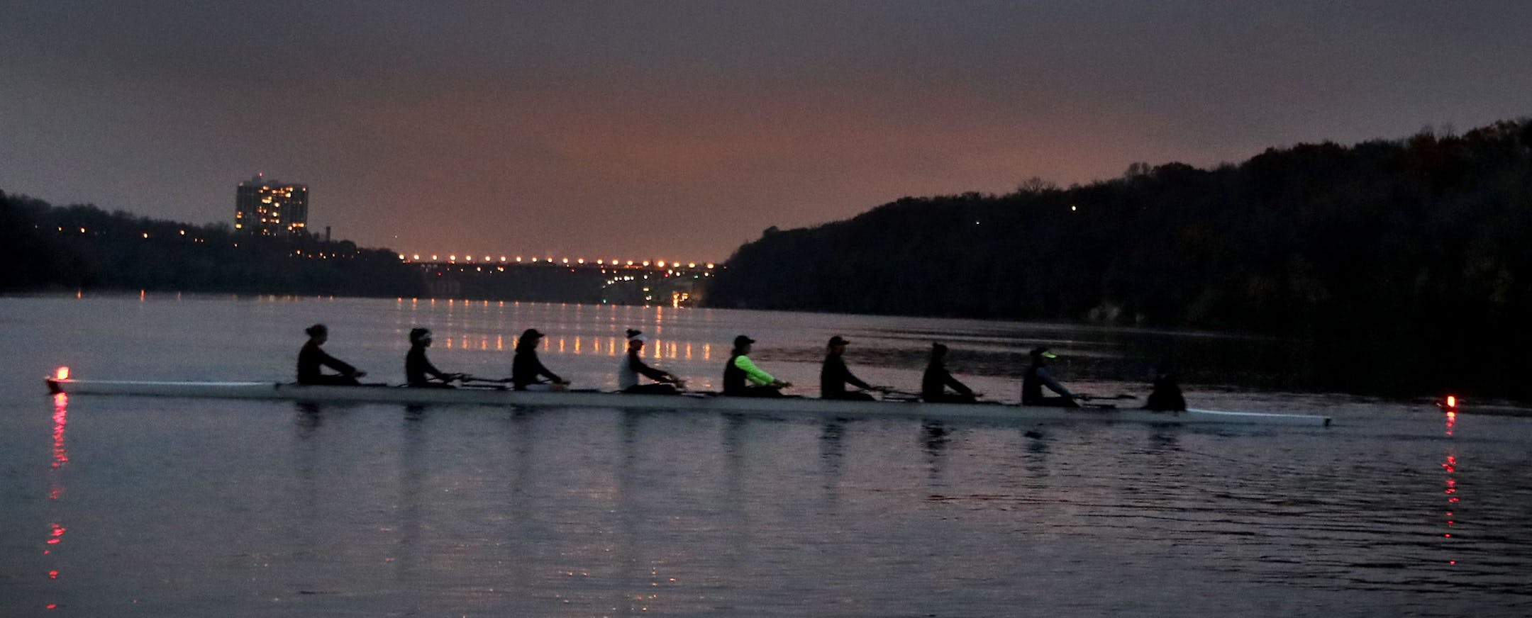 Members of the University of Minnesota rowing team get into position on the river for their morning work out Thursday, Oct. 27, 2016, on the Mississippi River in Minneapolis, MN.](DAVID JOLES/STARTRIBUNE)djoles@startribune.com "The Boys in the Boat'' book, about the mystical powers of competitive rowing. The Gophers rowing team will be in his column, and we'd like photos of the team working out and practicing and the scene around rowing