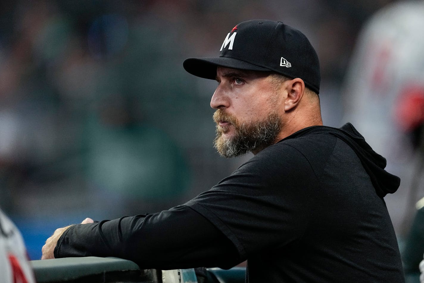 Minnesota Twins manager Rocco Baldelli (5) looks on from the dugout during a baseball game against the Atlanta Braves, Monday, June 26, 2023, in Atlanta. (AP Photo/John Bazemore)