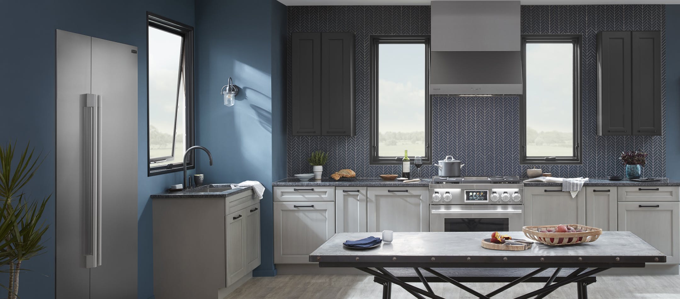 Tim Nehotte Photography
Top trends in kitchen design: Big, bold windows (in black!); mixing of cabinet styles and finishes; navy is the new black; and customized appliances.