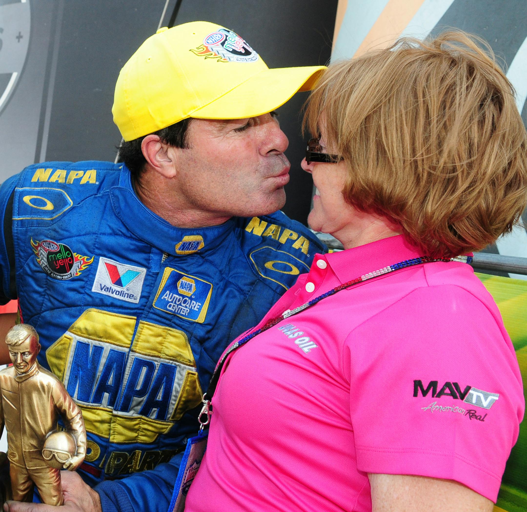 Funny Car racer Ron Capps tried to kiss Charlotte Lucas, co-founder of Lucas Oil, after winning the Funny Car final at the Lucas Oil NHRA Nationals at Brainerd International Raceway on Sunday. Capps topped Matt Hagen with a low E.T. of 4.063 seconds and a top speed of 312.28 mph.