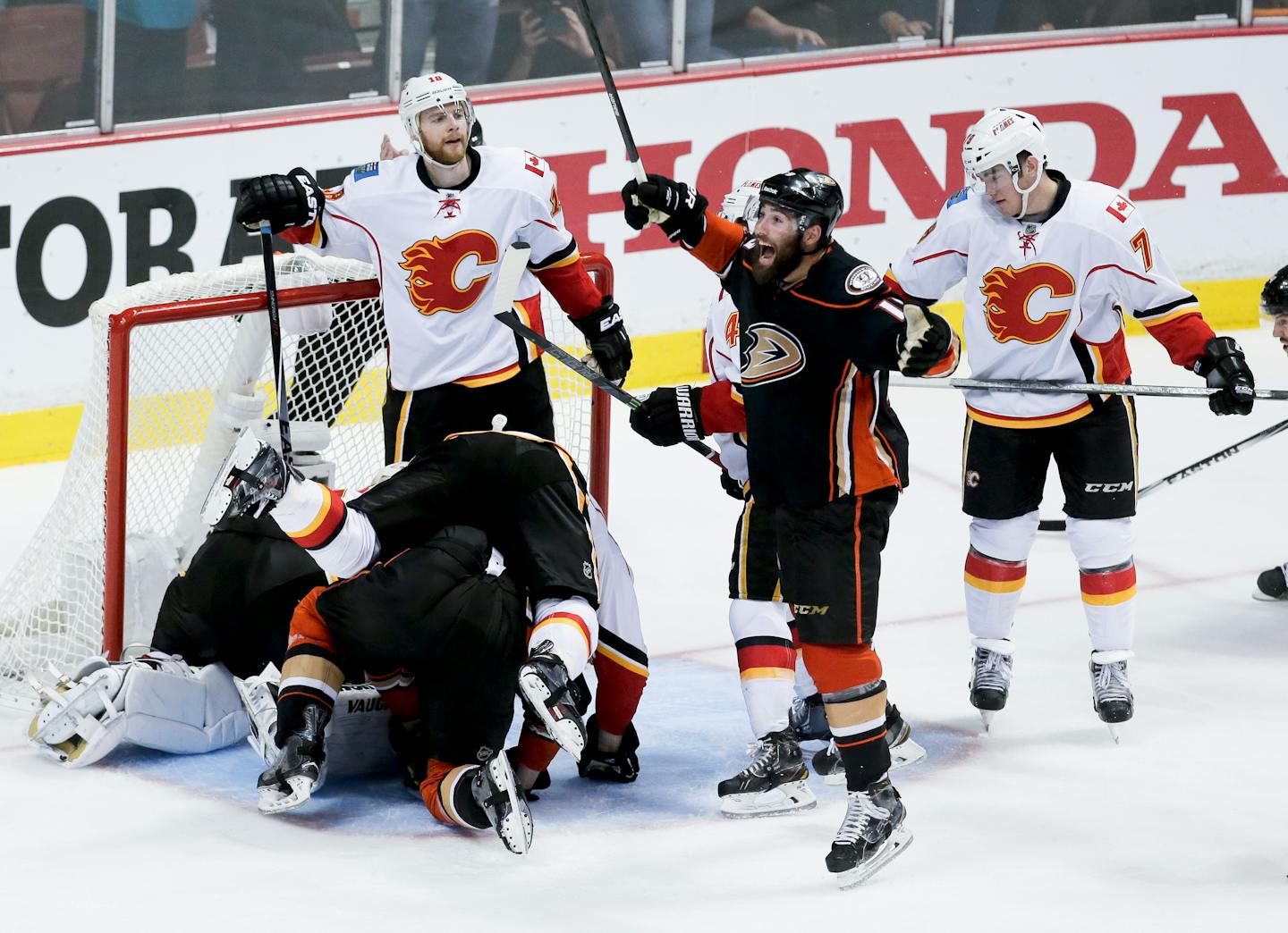 Anaheim Ducks left wing Patrick Maroon celebrates after Corey Perry's game winning goal during overtime in Game 5 of an NHL hockey second-round playoff series in Anaheim.