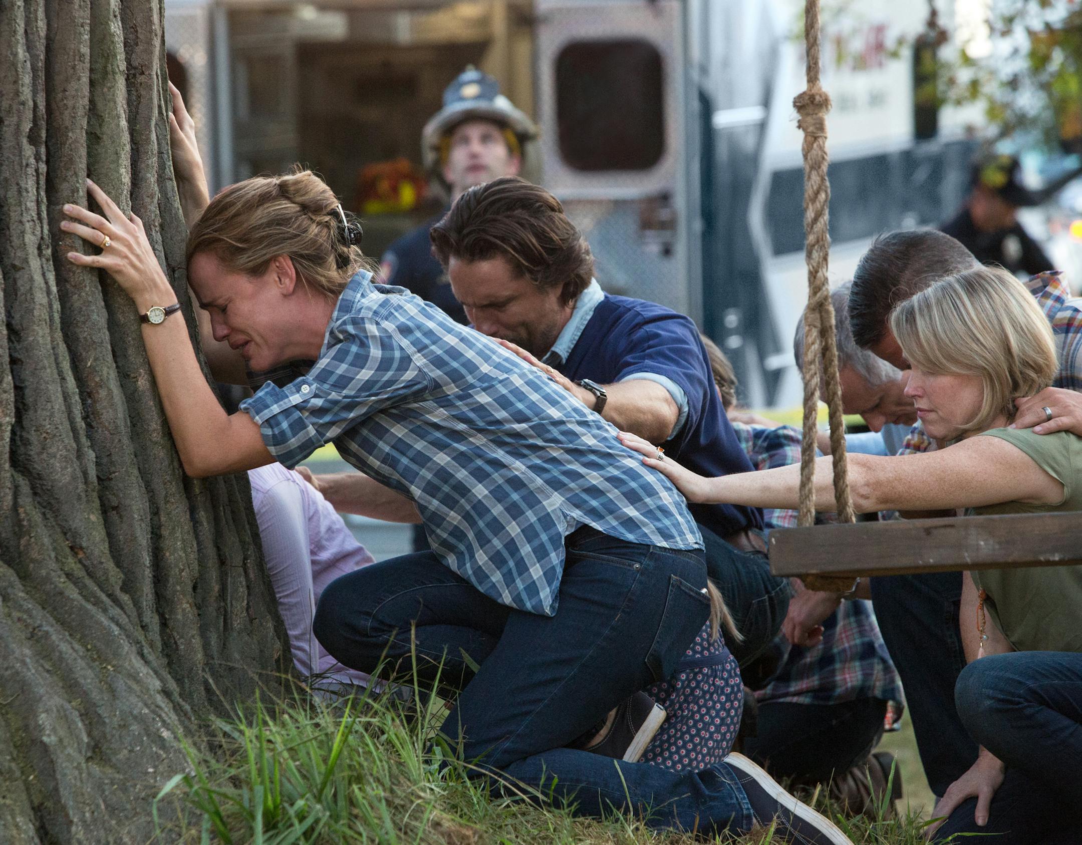 This image released by Sony Pictures shows, from left, Jennifer Garner, Martin Henderson and Kelly Collins Lintz in a scene from Columbia Pictures', "Miracles from Heaven." (Chuck Zlotnick/Sony Pictures via AP)