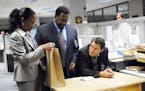 From left: Sonja Sohn, Wendell Pierce and Dominic West are shown in a scene from HBO's "The Wire."