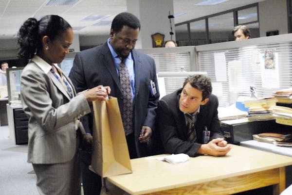 From left: Sonja Sohn, Wendell Pierce and Dominic West are shown in a scene from HBO's "The Wire."