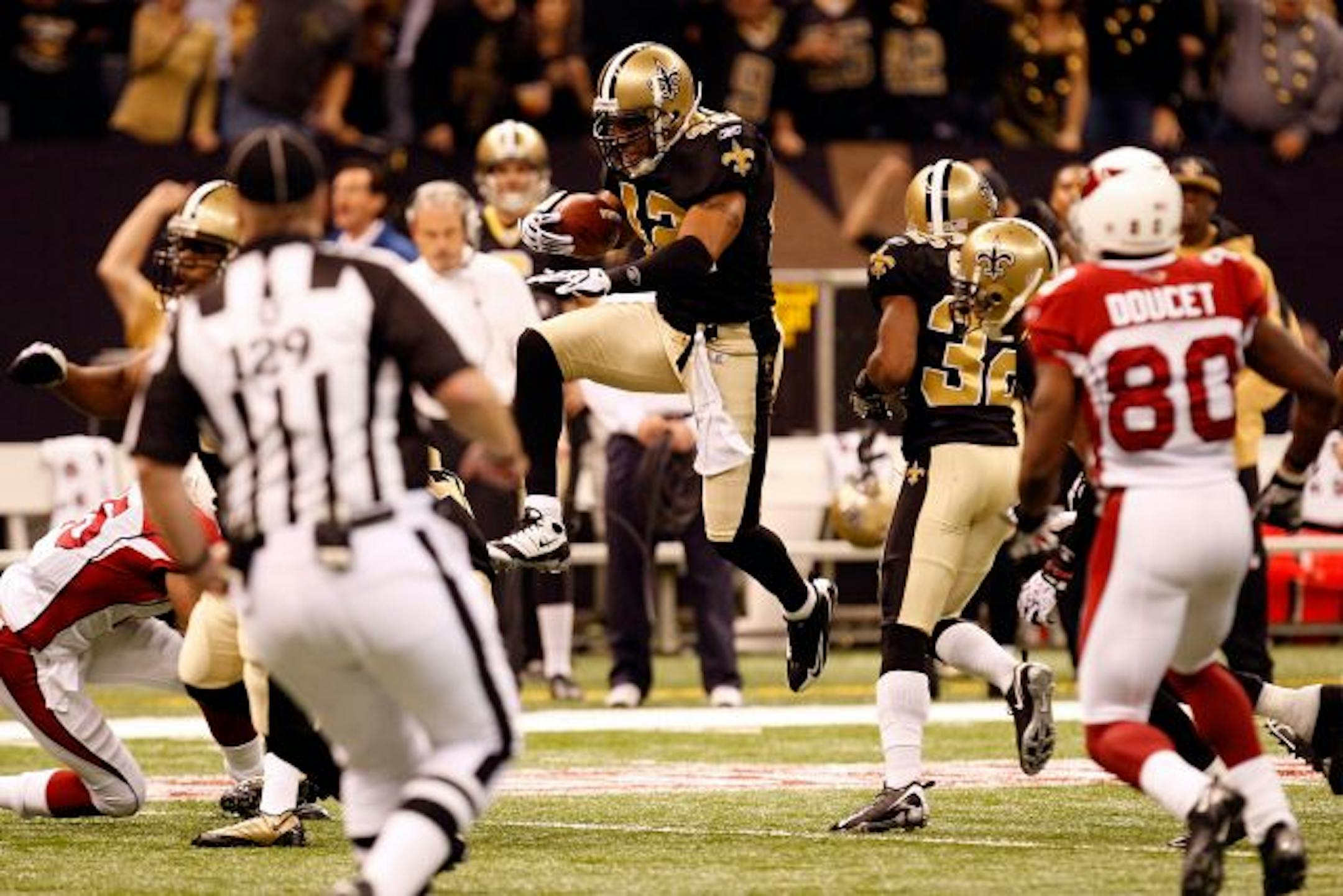Saints safety Darren Sharper tied for the NFL lead with nine interceptions this season, running three of them back for touchdowns.