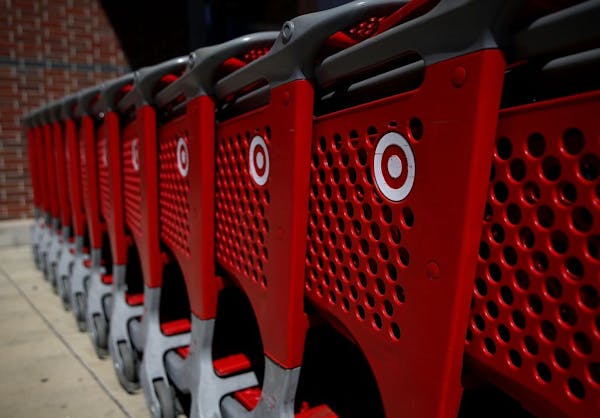 In this file image, the Target logo is displayed on shopping carts outside of Target store in California.