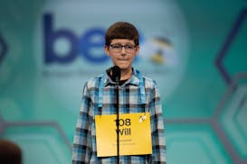 William Rausch, 12, from Royalton, Minn., competes during the Scripps National Spelling Bee, Tuesday, May 30, 2023, in Oxon Hill, Md. (AP Photo/Nathan