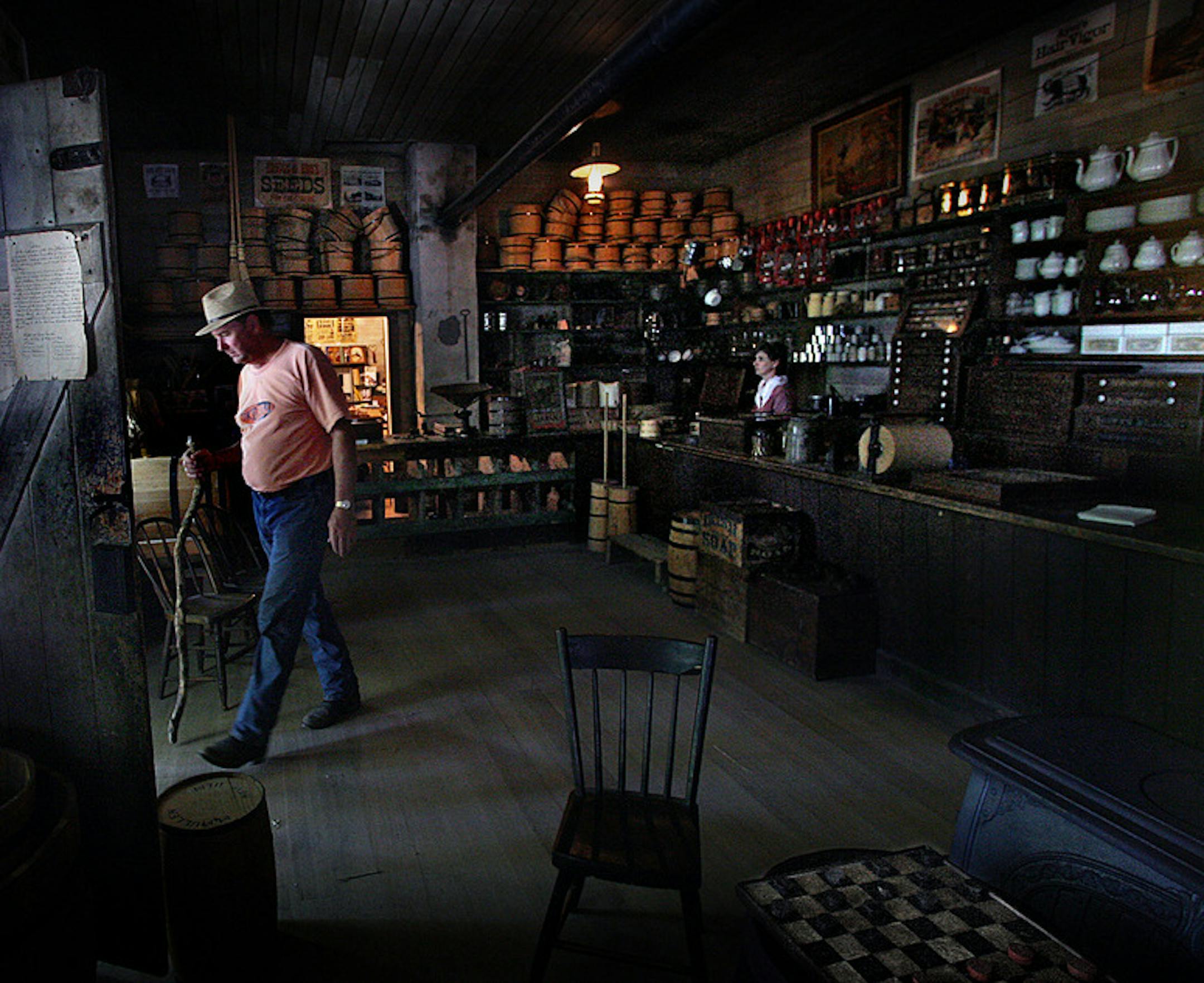 JIM GEHRZ ï jgehrz@startribune.com New Ulm/July 8, 2006/5:00PM Duane Daleske, Welcome, MN, explores the Harkin Store, which served the thriving community of West Newton in 1870. Today the general store (located 8 miles north of New Ulm on Nicollet County Rd. 21) serves as a museum operated by the Minnesota Historical Society. Site manager and guide Ruth Grewe is behind the counter at right.