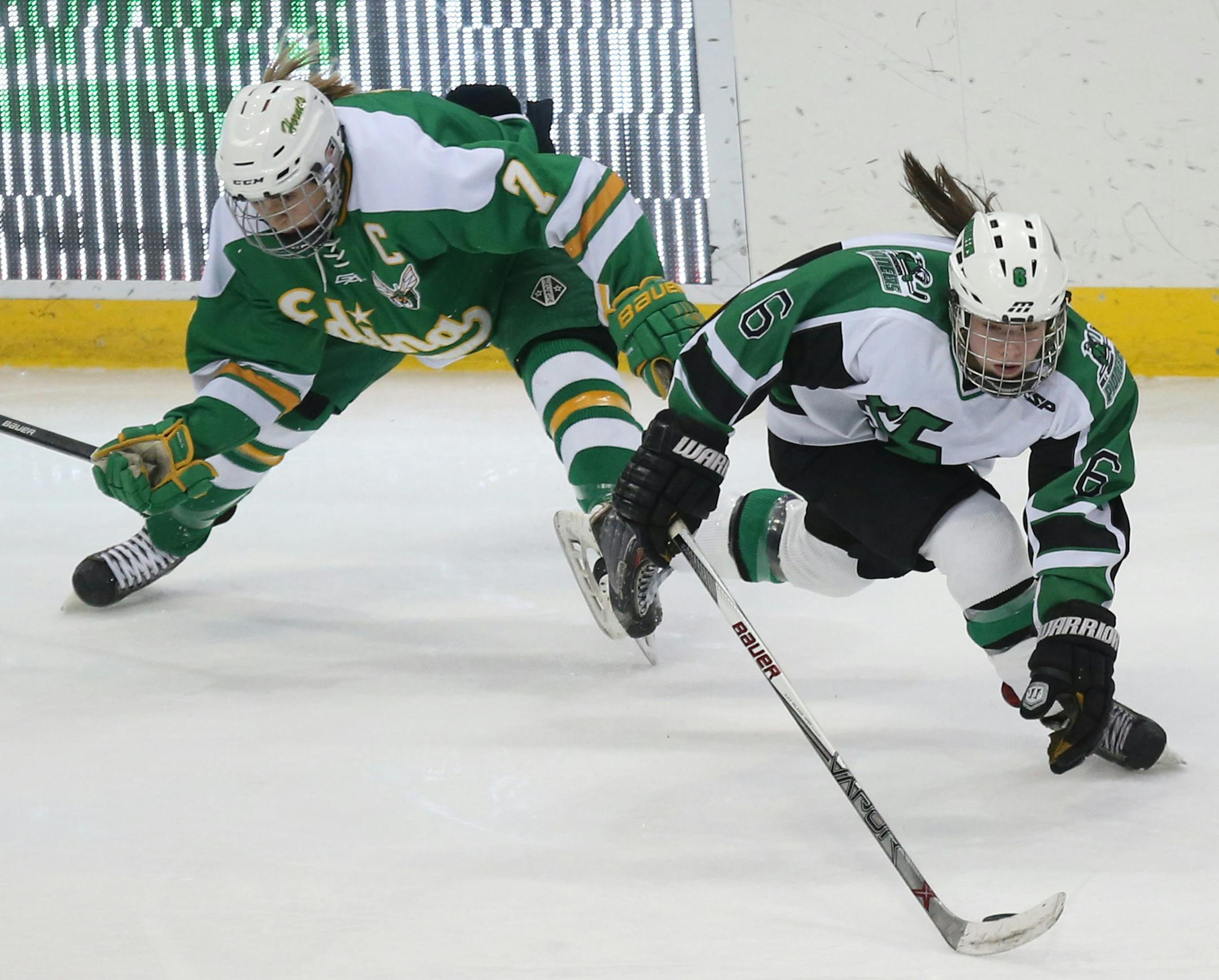 Edina's Taylor Williamson got called for tripping of Hill-Murray's Jac Kaasa in the first period. ] (KYNDELL HARKNESS/STAR TRIBUNE) kyndell.harkness@startribune.com Hill-Murray vs Edina in the 2A semifinals at the Xcel Energy Center in St Paul, Min., Friday, February 20, 2015. Hill-Murray won over Edina 2-1. ORG XMIT: MIN1502202054042430