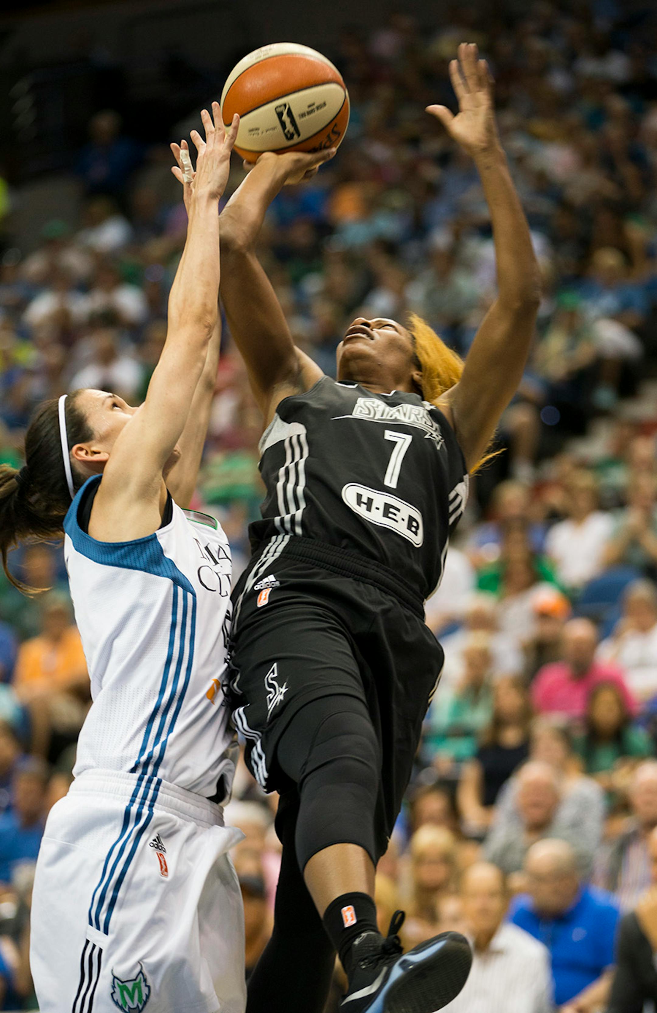 Lynx Anna Cruz fouled on an attempted block on San Antonio's Jia Perkins in the first half.