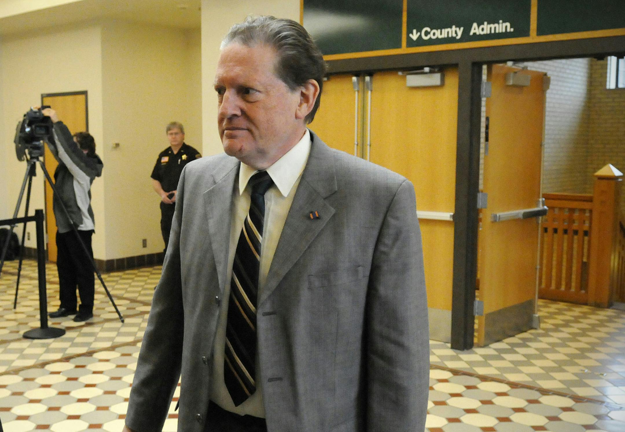 Byron Smith walks into the courtroom to hear the verdict in his murder trial in Little Falls, Minn., Tuesday, April 29, 2014. Smith was found guilty on all four counts against him for the 2012 Thanksgiving Day shooting of two teenagers.