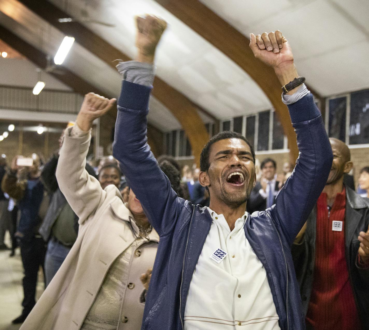 Gilberto Alves Araujo of Johannesburg cheers during the concert. ] LEILA NAVIDI &#xef; leila.navidi@startribune.com BACKGROUND INFORMATION: The Minnesota Orchestra performs a concert at Regina Mundi Church in Soweto, South Africa on Friday, August 17, 2018.