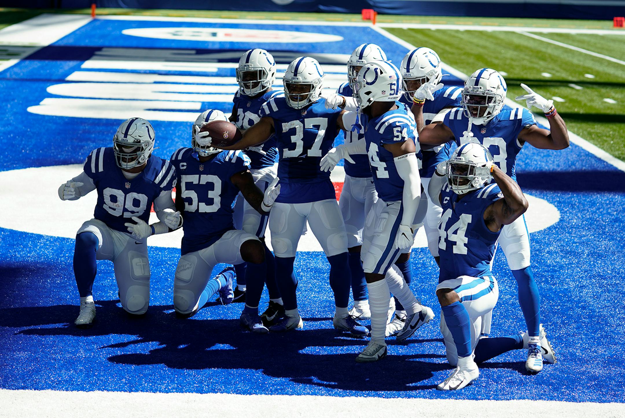 Indianapolis Colts' Khari Willis (37) celebrates an interception with teammates during the first half of an NFL football game against the Minnesota Vikings, Sunday, Sept. 20, 2020, in Indianapolis.