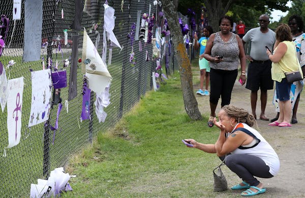 Marva White of Warren, Mich., visited Prince's Paisley Park compound on Monday in Chanhassen, where fans are still leaving memorial tributes. "It's li