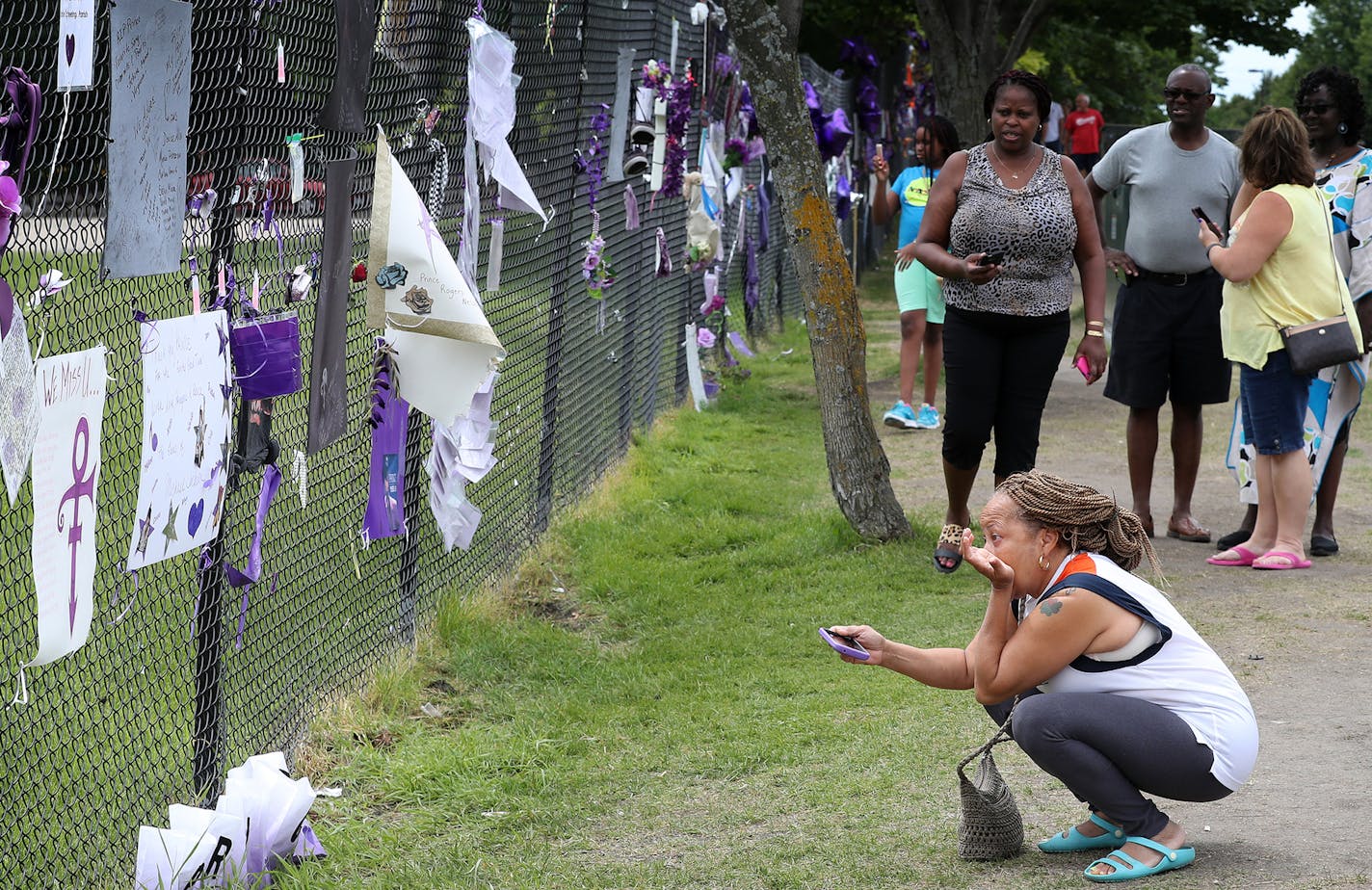 Marva White of Warren, Mich., visited Prince's Paisley Park compound on Monday in Chanhassen, where fans are still leaving memorial tributes. "It's like someone you grew up with," she said. "It's like a family member."