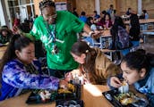 Lunch monitor Marqueta Henderson checked in on the kids eating their bison nachos at the American Indian Magnet School in St. Paul on Monday.