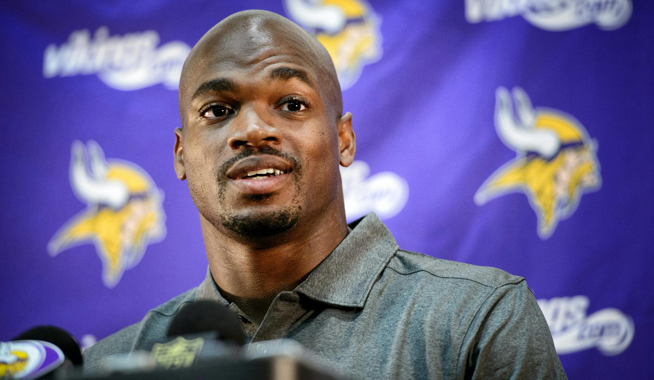 Vikings running back Adrian Peterson speaks at a news conference in Eden Prairie, Minn., Tuesday June 2, 2015. Peterson practiced with the Vikings for the first time in nine months on Tuesday. (GLEN STUBBE/Star Tribune via AP) MANDATORY CREDIT; ST. PAUL PIONEER PRESS OUT; MAGS OUT; TWIN CITIES LOCAL TELEVISION OUT