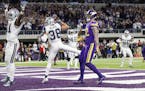 Cowboys defenders celebrated after a pass sailed past Kyle Rudolph (82) on a two point conversion attempt late in the fourth quarter last week.