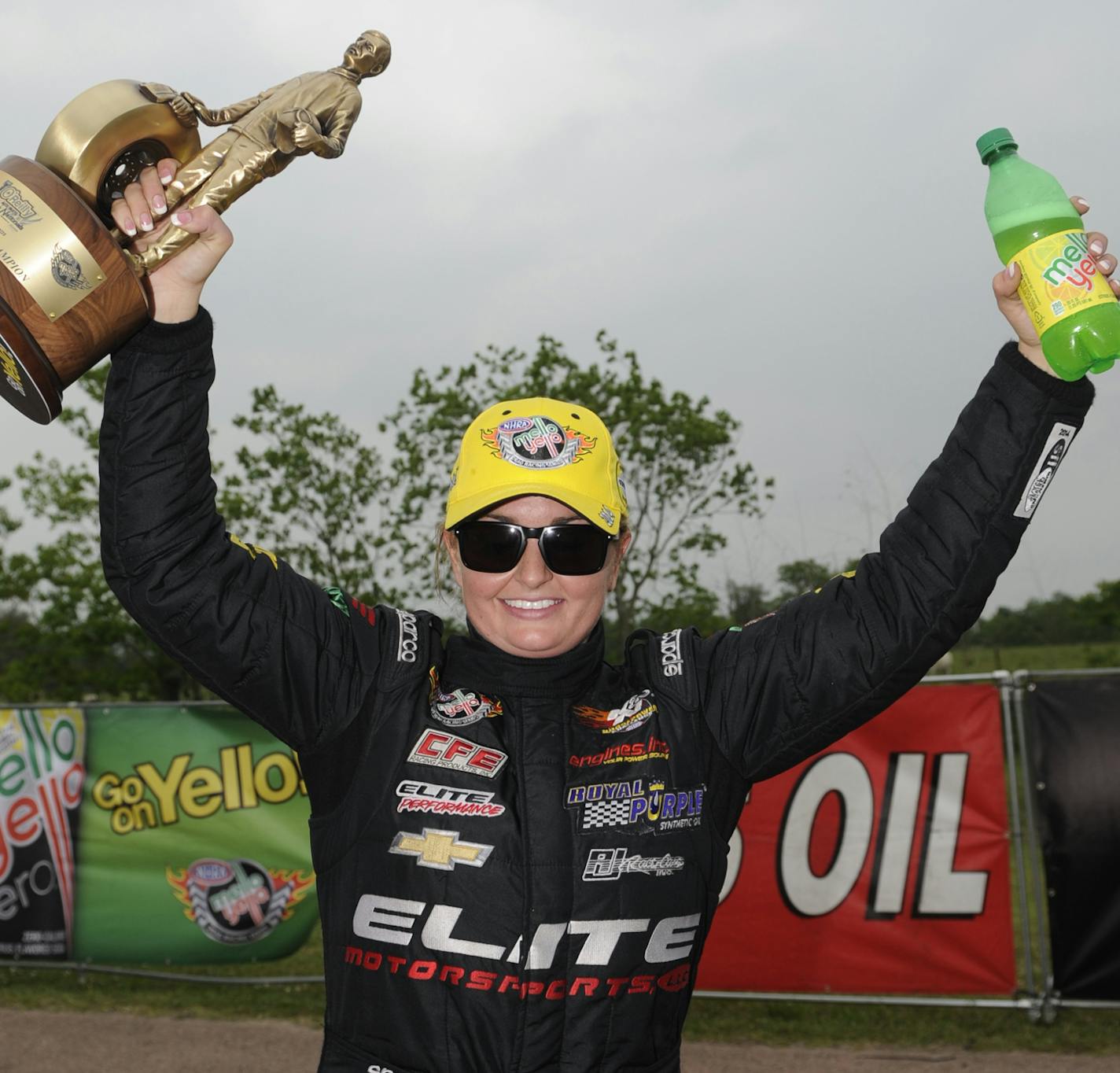 In this photo submitted by the NHRA, Erica Enders-Stevens celebrates her first career win at Royal Purple Raceway located outside of her hometown of Houston, Sunday, April 27, 2014, in Baytown. Enders-Stevens secured her second win of the season, eighth of her career and earned the 99th victory by a woman in the NHRA Mello Yello Drag Racing Series. (AP Photo/NHRA, Jerry Foss) ORG XMIT: NHRA102