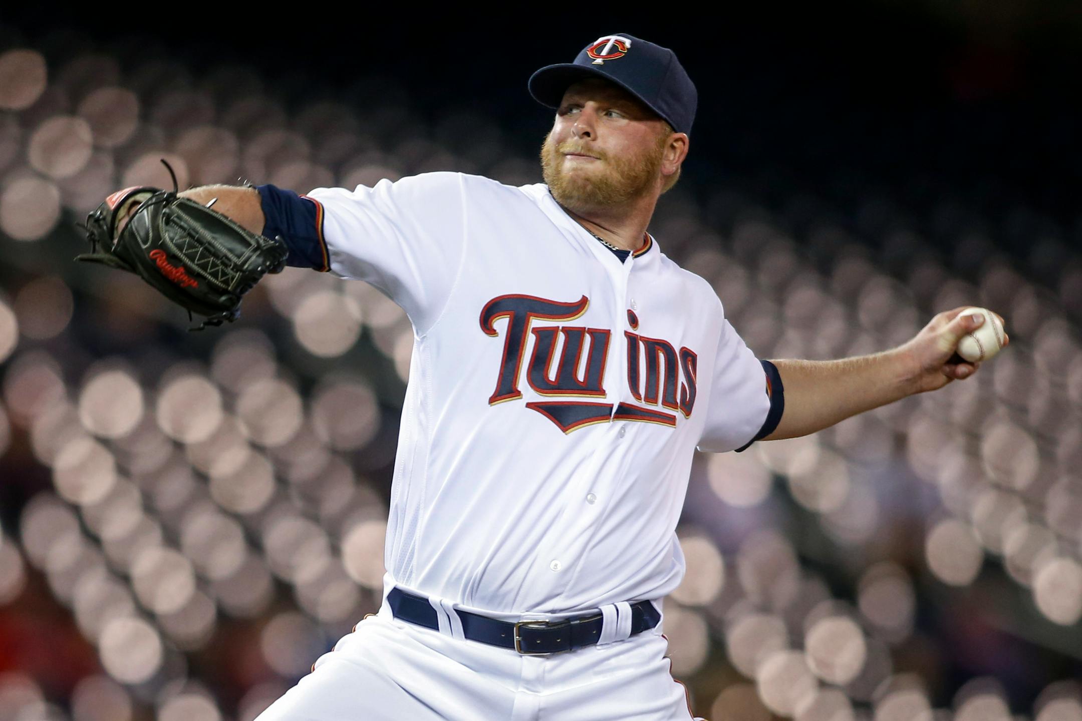 Minnesota Twins relief pitcher Buddy Boshers throws to the Miami Marlins during the 11th inning of a baseball game Tuesday, June 7, 2016, in Minneapolis. The Twins won 6-4 in 11 innings. (AP Photo/Bruce Kluckhohn)