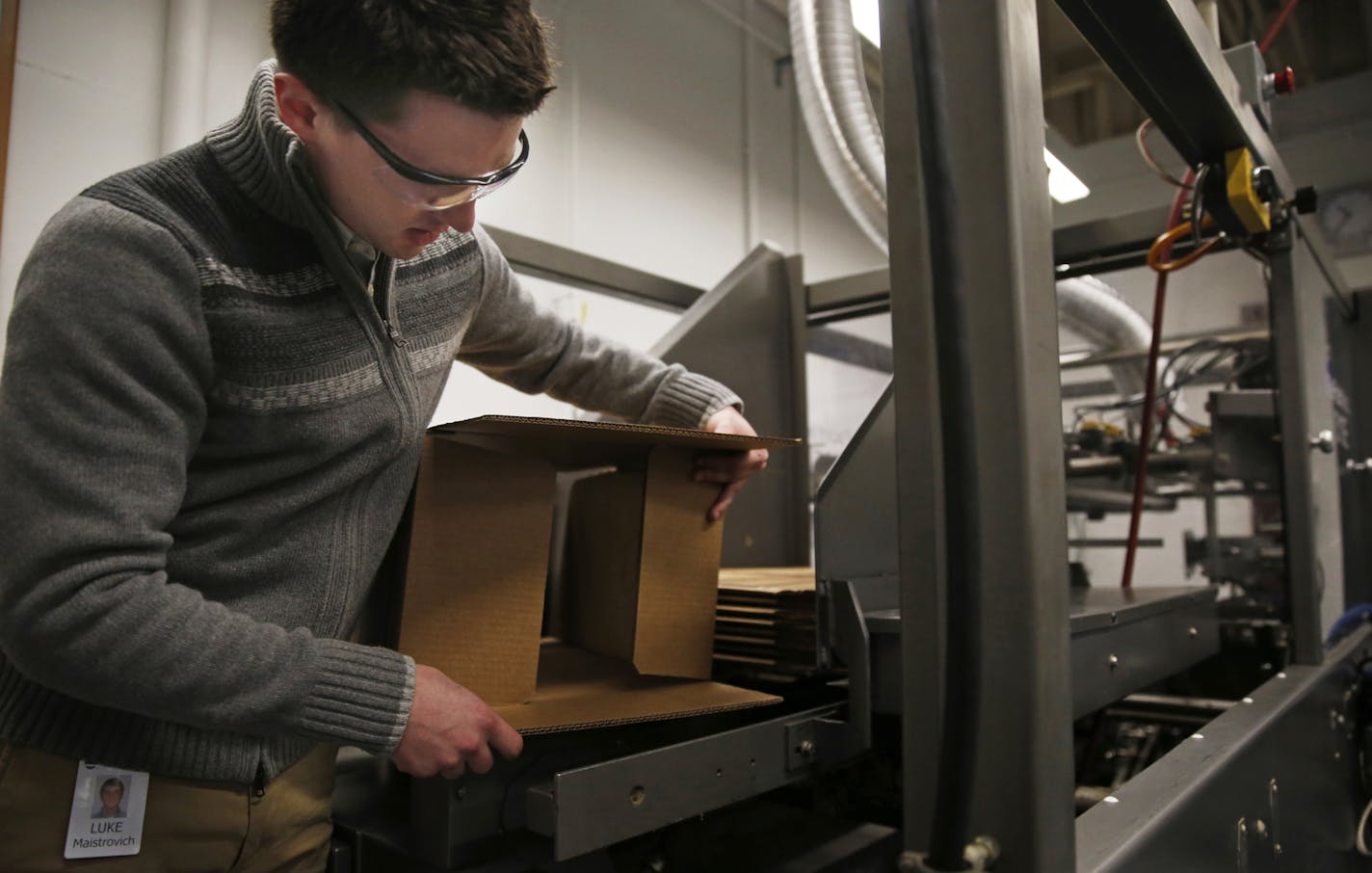 At H.B. Fuller&#x2019;s research facility in Vadnais Heights, engineer Luke Maistrovich showed how innovative packaging glues improve carton strength and quality.