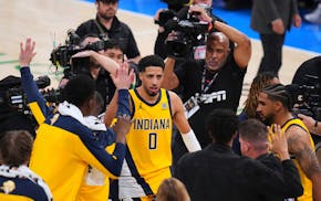 Indiana Pacers guard Tyrese Haliburton (0) leaves the court after winning Game 1 of the NBA Finals basketball series against the Oklahoma City Thunder